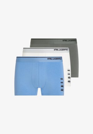 Három pár férfi boxeralsó kék, fehér és szürke színekben, mindegyiken Karl Lagerfeld logó a derékrészen és kis arc grafikával a lábán.