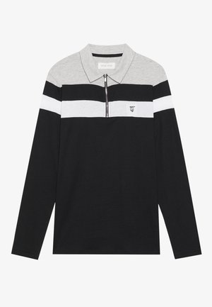 Long-sleeved polo shirt featuring a grey collar, black body, and horizontal white and grey stripes. Front zip closure and logo detail on the chest.
