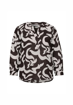 Langärmelige Bluse mit schwarz-weißem abstraktem Wirbelmuster, V-Ausschnitt und geknöpften Manschetten vor einfarbigem Hintergrund.