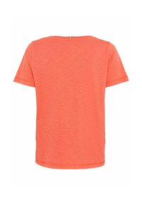 Kortærmet, løstsiddende t-shirt i lys koralfarve. Fremstillet af tekstureret stof med en blød finish. Rund halsudskæring og lige søm.
