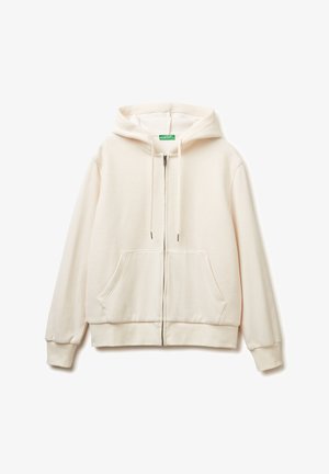 Světlý béžový mikina s waflovou strukturou, se zipem vpředu, s kapucí na šňůrku a dvěma předními kapsami. Měkká tkanina s žebrovanými lemy a spodním okrajem.