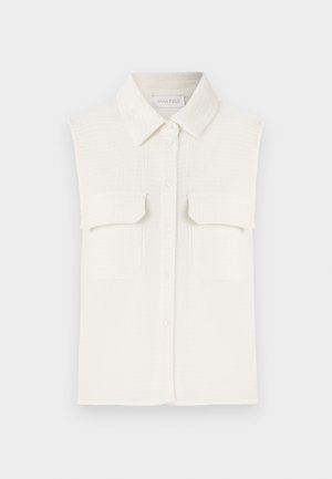 White, sleeveless shirt with a textured fabric, button-down front, collar, and two chest pockets.
