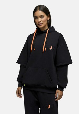 Saē, Sweat à capuche - noir