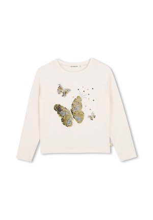 Chemise beige à manches longues avec trois papillons à sequins et petits motifs d'étoiles sur le devant.