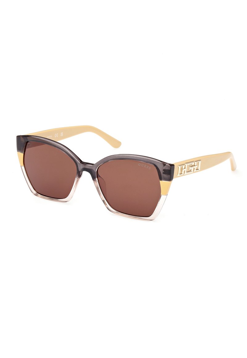 Guess Aurinkolasit - giallo-marrone