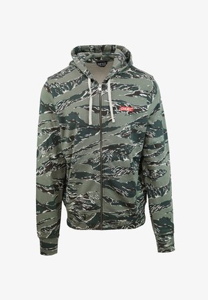 Zip-up hoodie met een groen en zwart tijger camouflagemotief, witte koordjes en een klein rood Diesel-logo op de linkerborst.