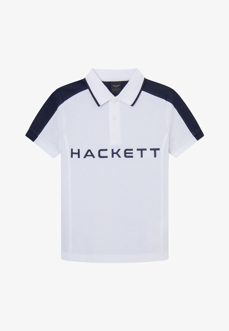Polo blanc avec épaules et bordure de col bleu marine, deux boutons, et logo "HACKETT" en lettres bleu marine sur la poitrine.