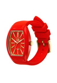 Orologio in gomma rossa con cassa rettangolare, dettagli dorati, grandi indicatori delle ore e cinturino testurizzato. Presenta un display della data nella parte inferiore.