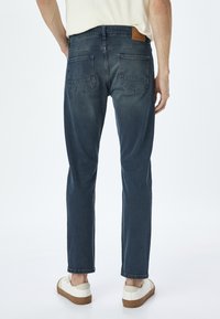 Koton - Jeansy Slim Fit