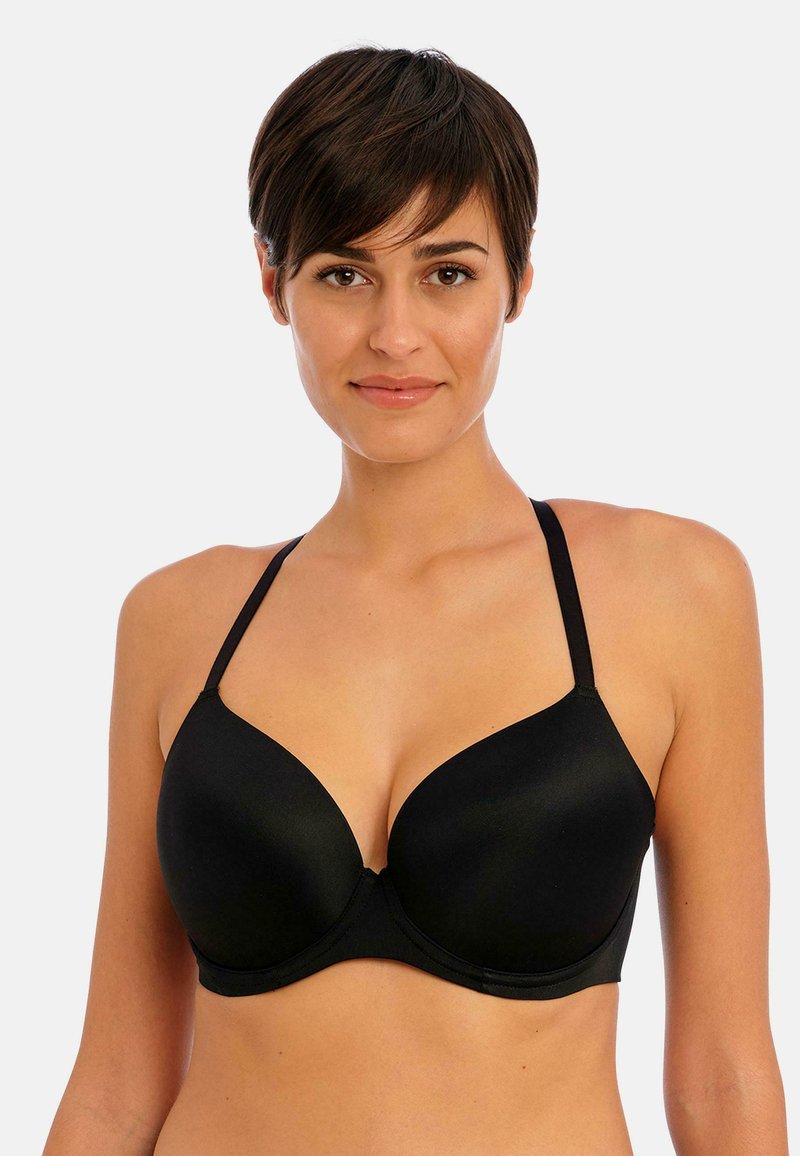 Soutien-gorge rembourré noir avec bretelles réglables, texture lisse et décolleté plongeant. Présente des bonnets sans couture et un soutien-gorge classique avec armatures.