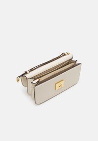 Beige leather wallet with a gold square clasp, featuring multiple compartments and brown accents on the zippers and edges.
