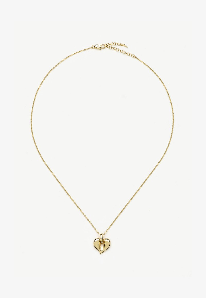 Λεπτό χρυσό κολιέ με γυαλιστερό, αφηρημένο μενταγιόν σε σχήμα καρδιάς που κρέμεται στο κέντρο πάνω σε άσπρο φόντο.