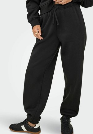 JOGGING BEST WEITER BEINSCHNITT - Pantaloni sportivi - black