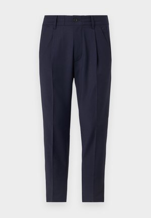 Marineblaue Hose mit schmaler Passform, ausgestattet mit Falten, einem Knopfverschluss und Seitentaschen. Hergestellt aus einem glatten Stoff mit leichtem Glanz.