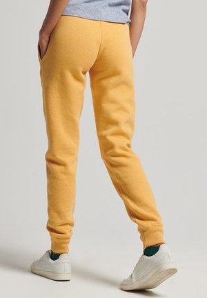 Superdry & Co, Pantalon de survêtement - yellow