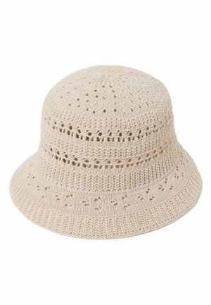 Beige hæklede bøttehat med mønstret åben strikkedesign og en let udvidet skygge.