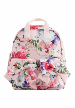 Pink floral backpack with large bows on front pockets and "Baker Ted Baker" logo in gold script.