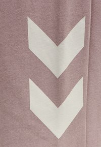 Hummel LEGACY TAPERED  - Träningsbyxor - woodrose