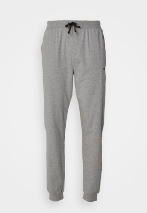 Graue Sweatpants mit elastischem Bund, Kordelzugverschluss, seitlichen Taschen, schmal zulaufendem Bein und gerippten Bündchen. Weicher, leichter Stoff.