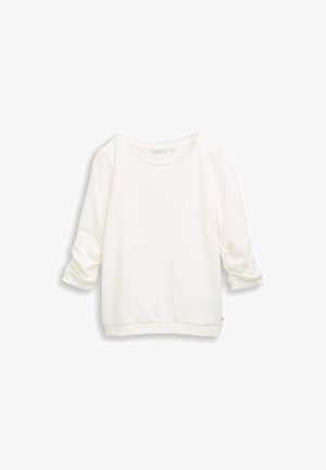 Bijela dukserica s okruglim izrezom, rukavima do tri četvrtine i blago skraćenom porubom. Mekana tekstura s rebrastim završetkom.