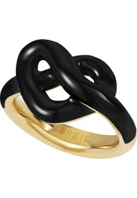 Svart abstrakt designring med släta kurvor, med en guldfärgad ring och polerad yta. Graverad med "BREIL" på den inre ringen.