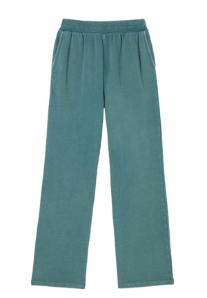 Loose-fitting, elastic waistband trousers in a soft teal fabric. Features two side pockets and a smooth texture throughout.
