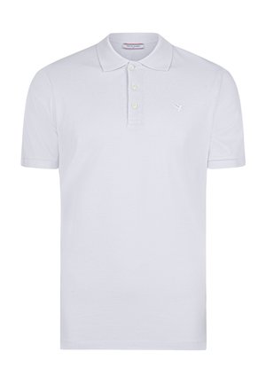 Polo shirt blanc en coton avec une finition texturée, présentant un col classique, trois boutons et un petit logo brodé sur la poitrine.