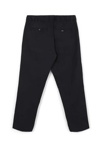 Pantaloni neri a sigaretta con cintura elastica e due tasche a filetto con bottone sul retro, visibili da dietro su uno sfondo bianco.