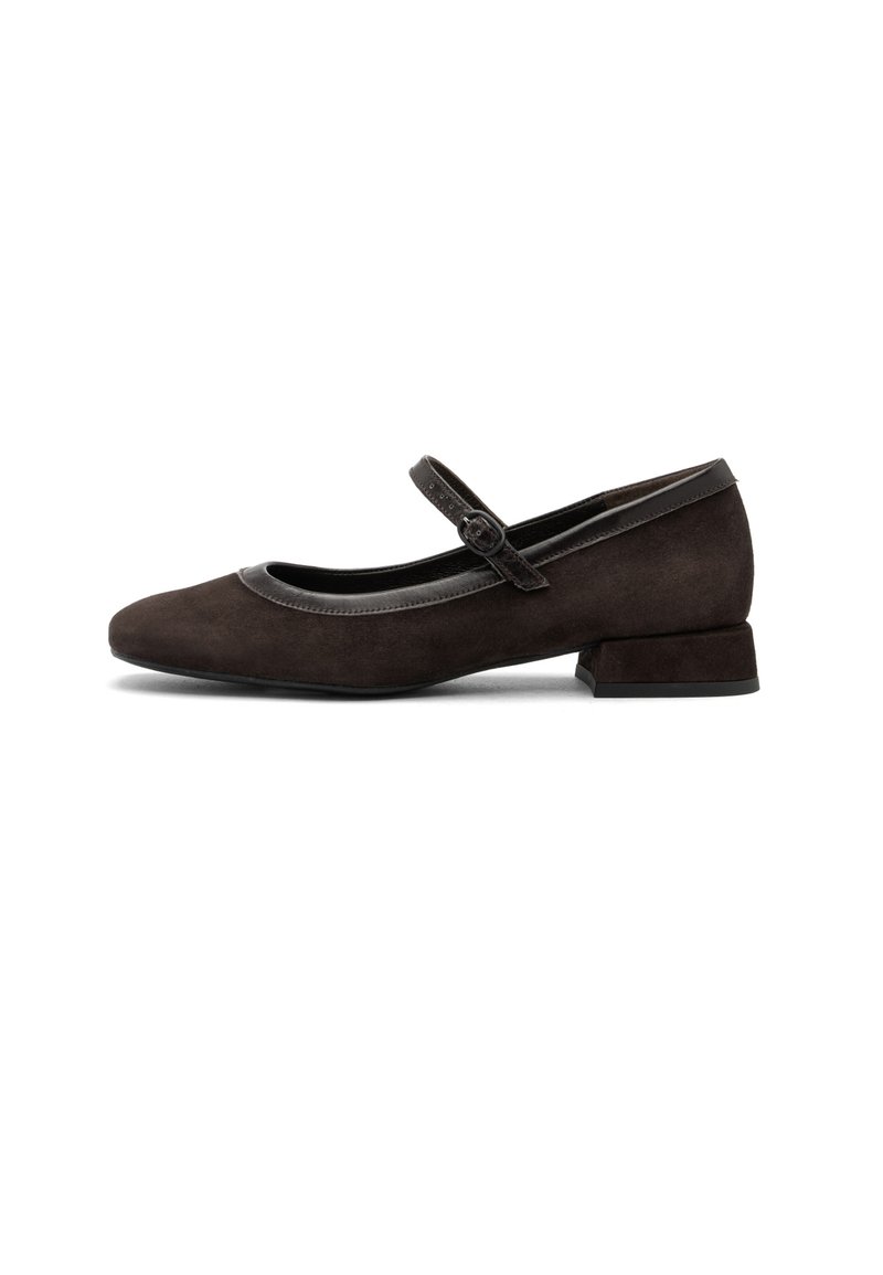 Dark brown suede Mary Jane shoe with low block heel, rounded toe, and adjustable strap with buckle across instep.