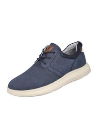 Zapatillas de deporte azul marino con cordones, con un upper texturizado, suela de goma blanca y etiqueta de cuero marrón. Cuenta con perforaciones para una mejor transpirabilidad.