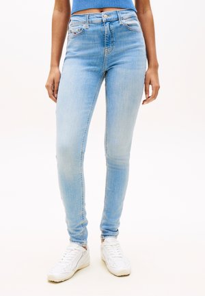 Tommy Jeans, NORA FADED MID RISE SKINNY JEANS - Kitsa lõikega teksad - denim light