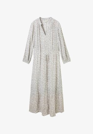 Lange, lichte jurk met een v-hals, lange mouwen en een elastische taille. Kenmerkt zich door een grijs en crèmekleurig geometrisch patroon in het geheel.