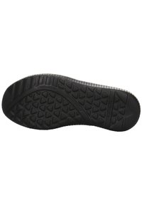 Black rubber sneaker outsole featuring a textured, tread pattern with triangular lugs for grip and raised sections for flexibility.