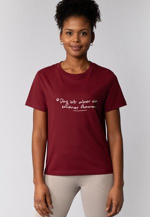 Burgunderfarbener Baumwoll-T-Shirt mit kurzen Ärmeln, versehen mit weißem Text im handschriftlichen Stil. Glatte Textur, klassisches Rundhalsdesign.