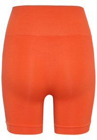 Hoge taille oranje shorts met een soepele textuur, een aansluitend design en een elastische tailleband. Beschikt over een eenvoudige, naadloze constructie.