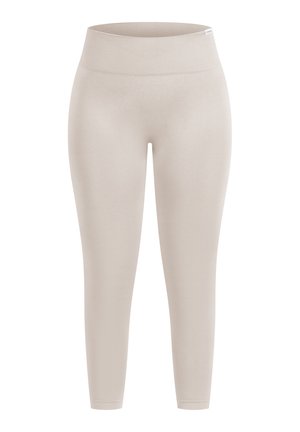 Leggings beige avec une large ceinture texturée. Fabriqués en tissu lisse et extensible, ils ont une coupe ajustée et des chevilles resserrées.