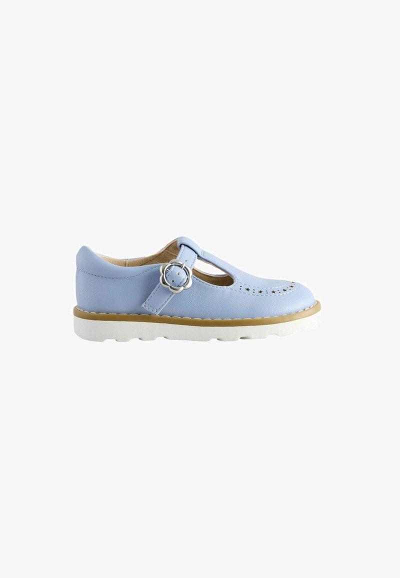 Light blue leather Mary Jane shoe with scalloped buckle strap, perforated star and dot patterns, beige trim, and white rubber sole.