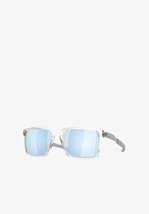 Quadratische Sonnenbrillen mit klarem Kunststoffrahmen und blau getönten Gläsern. Mit strukturierten blauen Akzenten an den Bügeln und silbernen Hardware-Details.