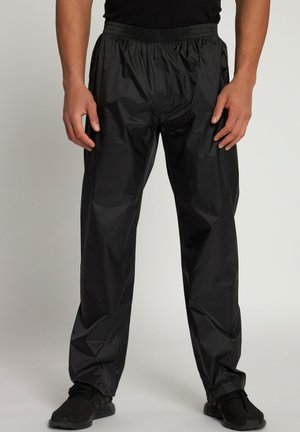 Zwarte waterdichte broek met een elastische tailleband, taps toelopend ontwerp en een gladde textuur. Bevat zijzakken en is gemaakt van lichtgewicht materiaal.