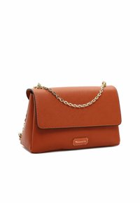Brown synthetic leather handbag with a gold chain strap, flap closure, and a small gold logo plaque on the front. Textured surface.