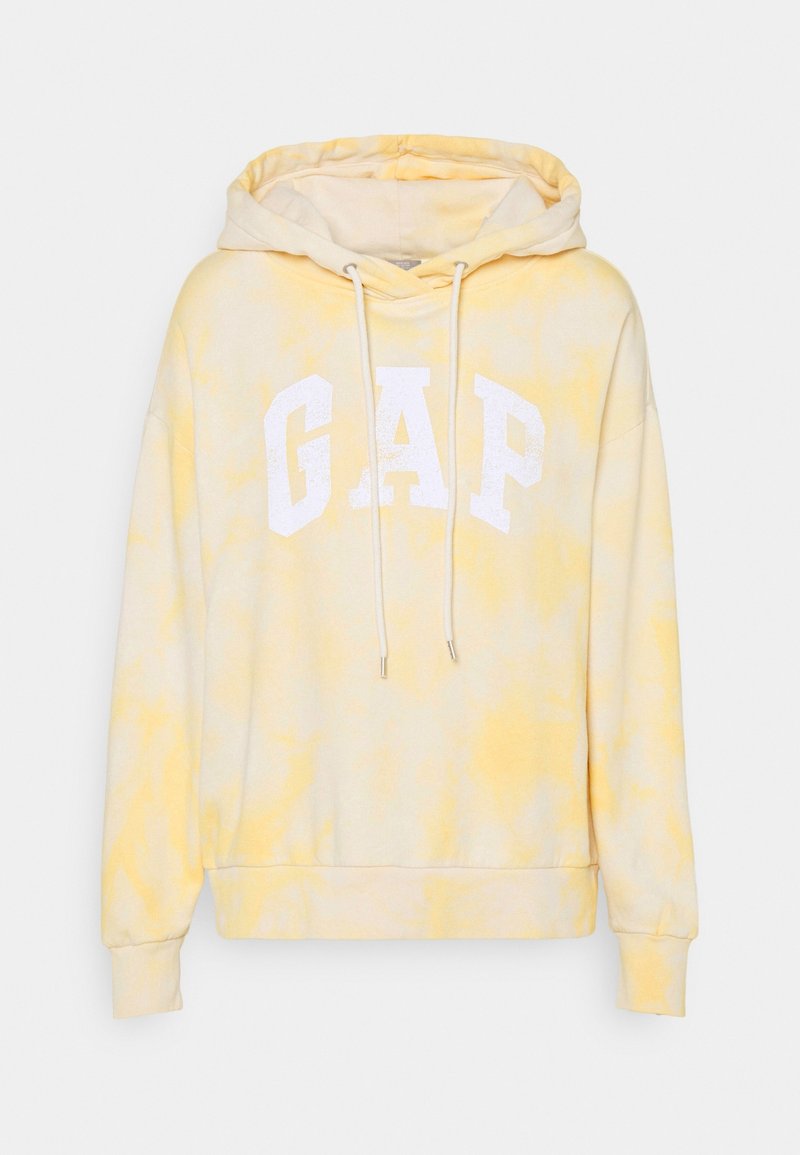 Felpa gialla tie-dye realizzata in tessuto morbido. Logo bianco "GAP" sul davanti. Presenta un cappuccio con cordoncino e polsini a costine.