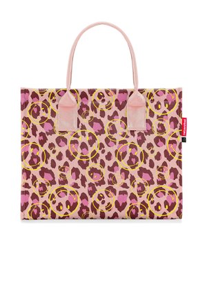 Sac cabas rectangulaire rose avec des taches de léopard marron et violet et des visages souriants jaunes, avec deux poignées roses et une étiquette de marque rouge.