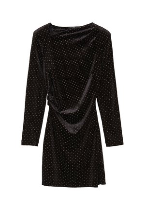 Schwarzes Samtkleid mit langen Ärmeln, goldenen Polka-Punkten und einem drapierten Vorderteil. Glatte Textur und lockere Silhouette.