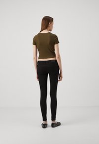 ONLY ONLCORAL LIFE POWER - Vaqueros pitillo - black denim