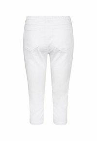 Biezi balti bikses ar elastīgu jostu, divām aizmugures kabatām un gludu, vieglu audumu. Dizains ir vienkāršs un tīrs.