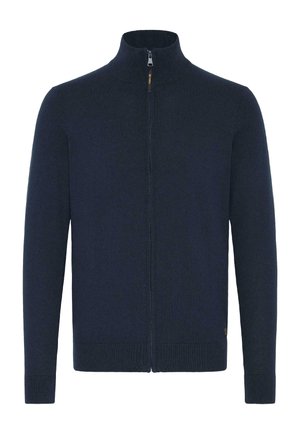 Temno modra zip-up jopica z visokim ovratnikom, izdelana iz mehkega pletenega materiala, z rebrastimi manšetami in robom za tesno prileganje.