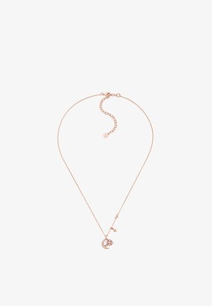 Vaaleanpunakultainen kaulaketju, jossa on herkkä ketju, jossa on puolikuun muotoinen riipus, jossa on kukkakuvio ja pieni tähden yksityiskohta.