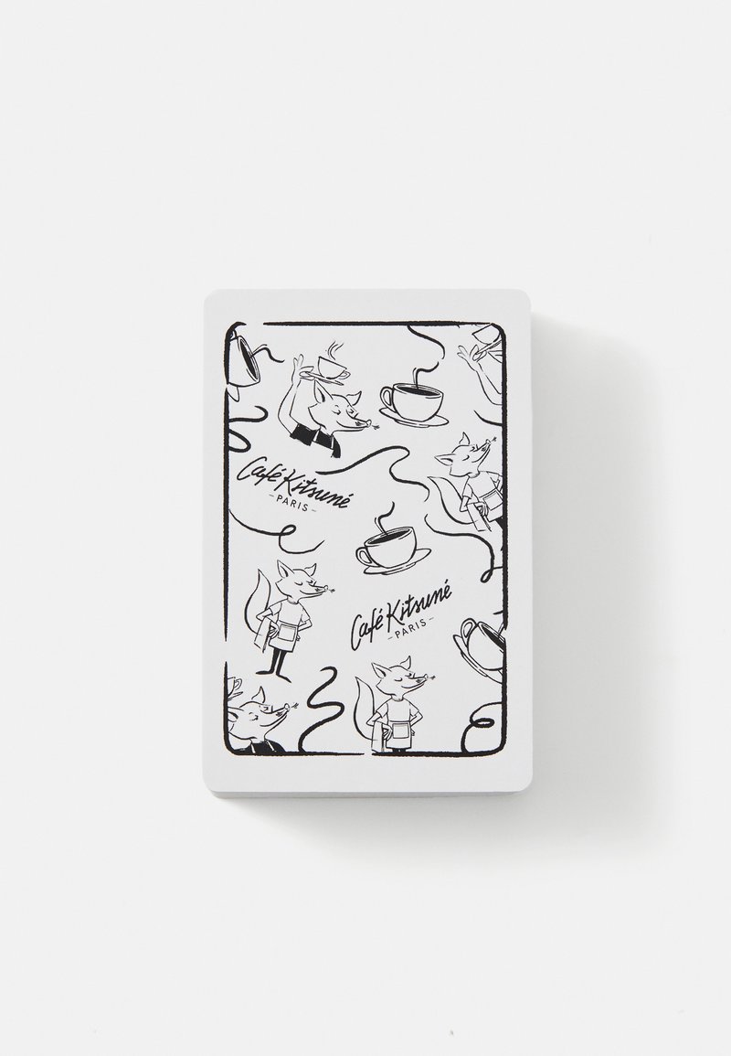 Playing cards with a white background featuring black line drawings of foxes, coffee cups, and "Café Kitsuné Paris" text in various placements.