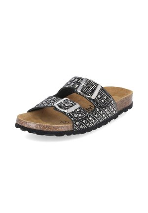 Sandalia negra tipo slide con dos tiras ajustables con hebilla, tachuelas plateadas en patrones geométricos, plantilla de corcho y suela negra texturizada.