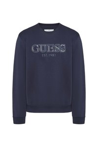 Sudadera azul marino hecha de mezcla de algodón, con cuello redondo, mangas largas y el logo "GUESS EST. 1981" en costura clara en el pecho.